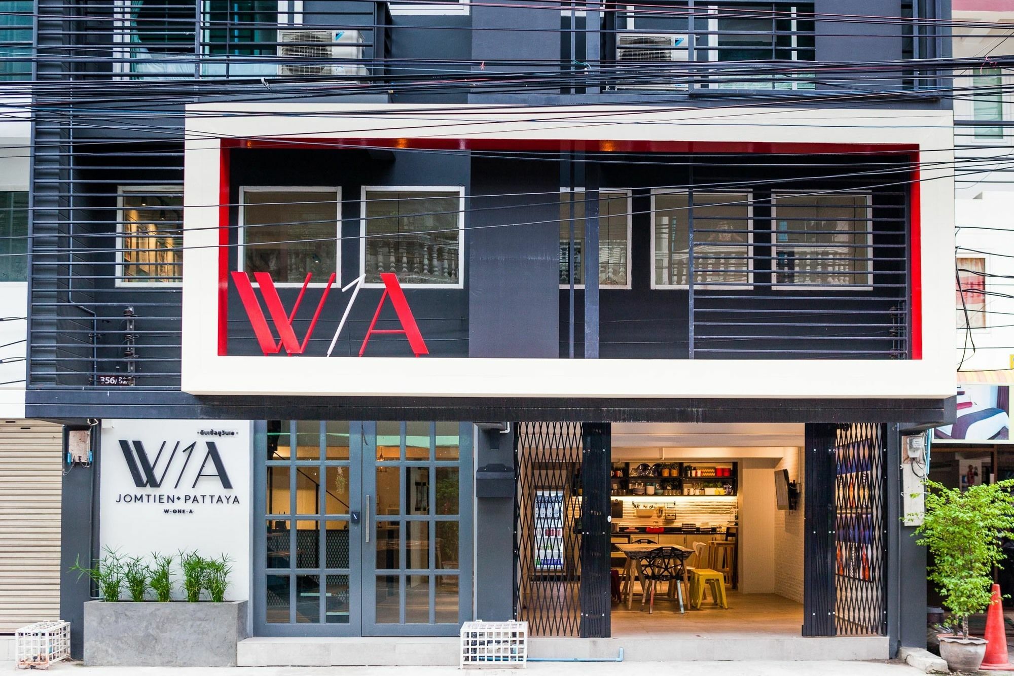W1A Jomtien Hotell Exteriör bild